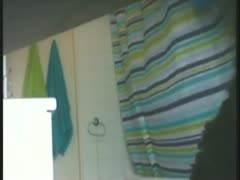 The way a friend's slutwife dries herself was captured on camera by a hidden webcam in the restroom.